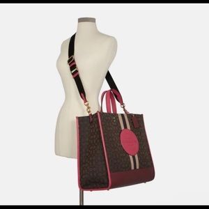 Authentic Dempsey Tote 40 in Signature Jacquard with strap and coach patch.